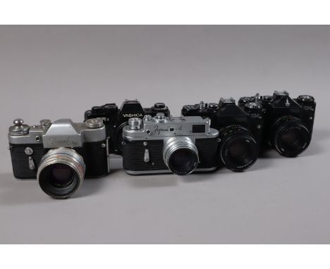 A Yashica FRI SLR Body and Four Russian KMZ Cameras, comprising a Yashica FRI body, shutter working, meter reacts to light, a