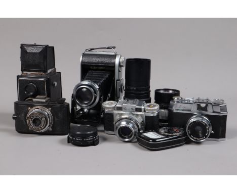 A Box of Camera Related Items, including an Ensign Selfix 820, G, A Halina 35x Super, a Braun Paxette, a Coronet Cub, lenses,