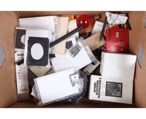 A Collection of Darkroom Accessories, including a Beck Enlarging Anastigmat lens, a Kodak darkroom mercury thermometer, a Ilf