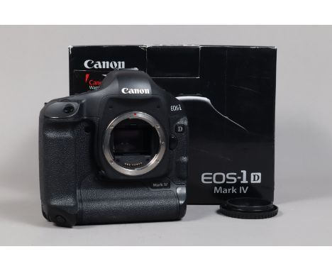 A Canon EOS-1D Mark IV DSLR Camera Body, serial no 1331300641, body G-VG, with body cap, strap, manual, battery, LC-E4 charge