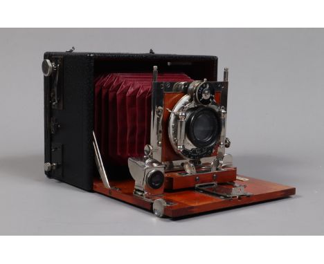 An Ernemann Heag VI Double Shutter Folding Plate Camera, circa 1920, 9 x 12cm format, body G, later 1/1000s focal plane shutt