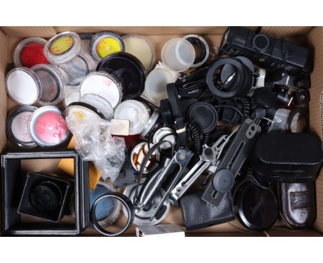 A Tray of Camera Related Accessories, including fitlers, various types and sizes, hood, light meters and other items