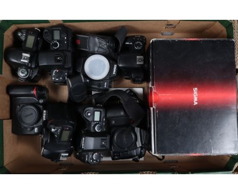 A Tray of Nikon and Other DSLR Bodies, comprising three Nikon D70 bodies, three Sigma SD9 bodies, one in maker's box, a Sigma