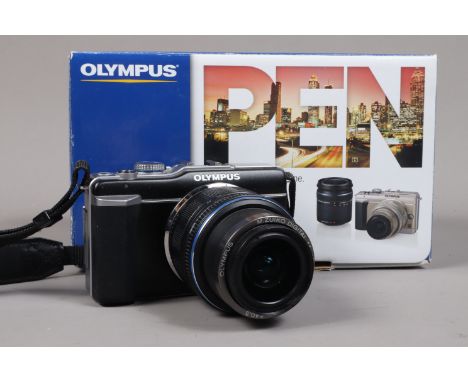 An Olympus E-PL1 Micro Four Thirds Camera, body G, digital mirrorless camera, M.Zuiko Digital 14-42mm f/3.5-5.6 lens, with ba