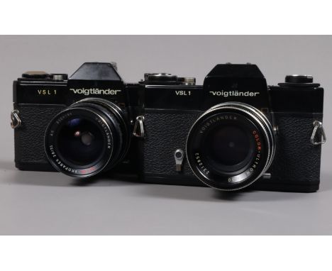 Two Voigtländer SLR Cameras, a Voigtlander VSL-1, shutter working, self timer working, meter unresponsive, body G, with Color