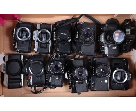 A Tray of SLR Cameras, including a Ricoh SLX 500, KR-10, both with 50mm Rikenon lenses, an Edixa 2 MTL, with Cosinon 55mm f/2