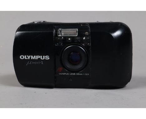 A Black Olympus ? [mju:]-1 (Infinity Stylus) Compact 35mm Camera serial no 7615437, body F, rubbing and label residue to back