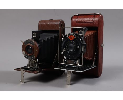 An Agfa Standard 254 Luxus Folding Camera, a brown Agfa Standard 254 Luxus, format 6 x 9cm on roll film, body G, shutter work