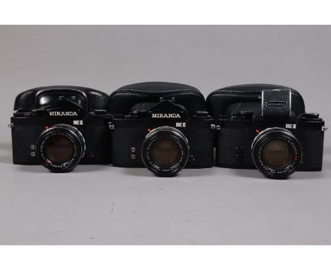 Three Miranda RE II SLR Cameras, three black cameras, bodies G-VG, two with eye level finders, one with a waist level finder,