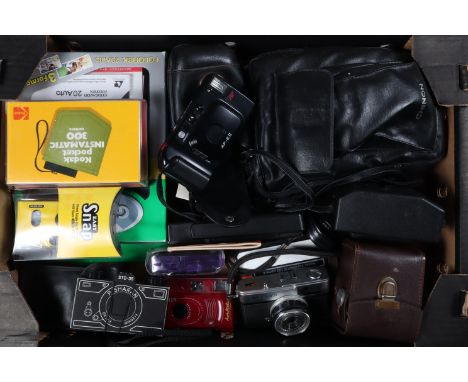 Various Compact Film Cameras, including an Olympus Trip 35, a green Dacora Daci Royal, a Fisher-Price 110 camera, made by Kod