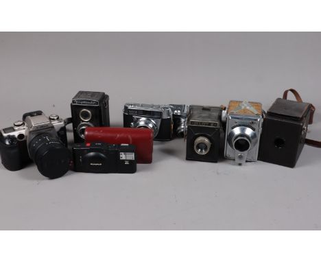 Various Cameras, comprising a Canon EOS 5OE SLR camera, a Voigtländer Vito B, a Voigtländer Brillant TLR with Vaskar 75mm f/4