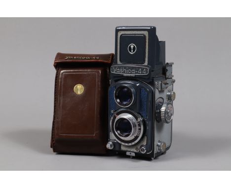 A Yashica 44-A TLR Camera, serial no FA 2051770, format 4 x 4cm on 127 roll film, body G, Copal shutter working, a Yashikor 6