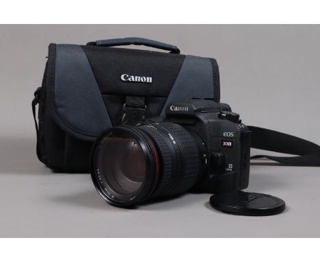 A Canon EOS 30V SLR Camera, serial no (21)12000400, body VG-E, date function version, shutter working, meter reacts to light,