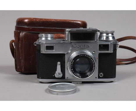 A Zeiss Ikon Contax III Rangefinder Camera type 544/24, serial no E9754, 1/125s shutter speed version, body G, shutter and ra