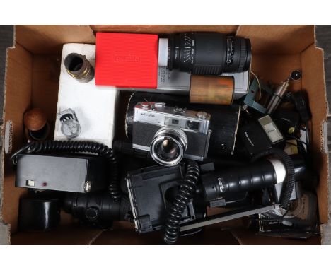 A Minolta 7s Camera and Various Accessories, A Minolta 7s rangefinder camera, a Cobra 700 AF flash for Nikon and a Cobra Pro-