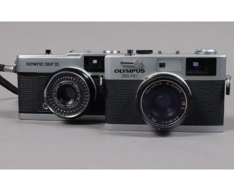 Two Olympus Compact Cameras, an Olympus 35 RC, shutter working, self timer working, meter responsive, body G-VG,  and a Trip 
