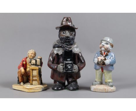 Three Pottery or Ceramic Charicature Photographer Figures, comprising a 28cm height figure of photographer wearing a felt hat