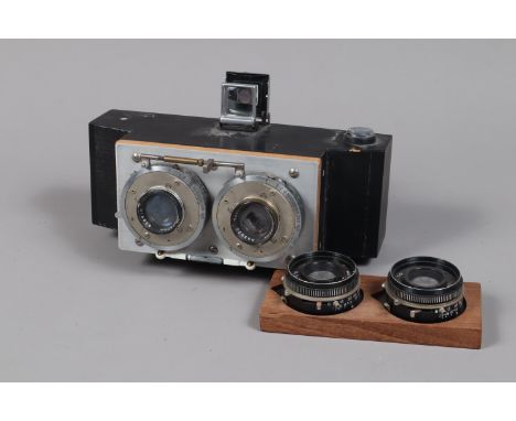 A Home Made Stereo Roll Film Camera, two 6 x 6cm frames on 120 film, wooden body and back with aluminium front and pressure p