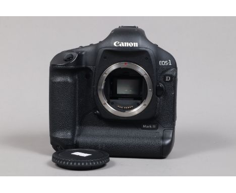 A Canon EOS-1D Mark III DSLR Camera Body,  serial no 524262, body G, light wear, with body cap, strap, battery and LC-E4 char
