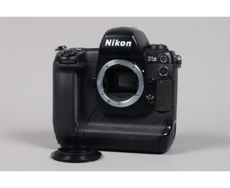 A Nikon D1x DSLR Camera Body, serial no 5117355, body G, some light wear, with body cap, battery and charger