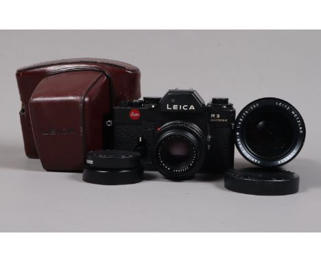 A Leica R3 Electronic SLR Camera, shutter issues, mirror not rising or sticking, erratic, body G, some pitting to base, with 