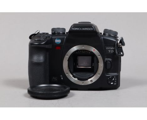 A Konica Minolta 7D DSLR Camera Body, powers up, shutter working, body G-VG, with battery &amp; charger