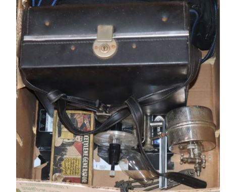 A quantity of cameras and camera equipment