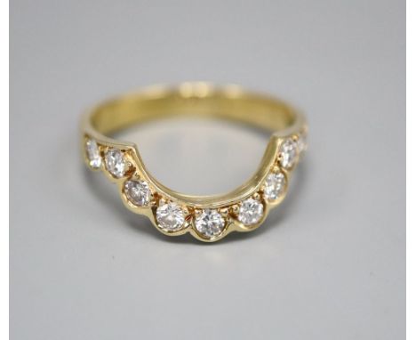 An 18ct gold and diamond dress ring, size K