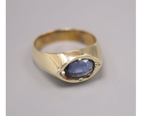 A 14ct gold and sapphire dress ring, size Q, gross 7.8 grams
