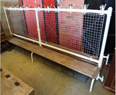 A vintage school cloakroom two sided bench, W.300cm, D.60cm, H.132cm