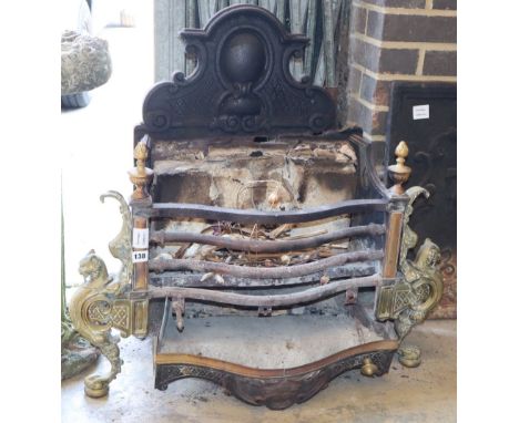 A cast iron and brass fire grate, W.82cm, H.76cm, a.f.