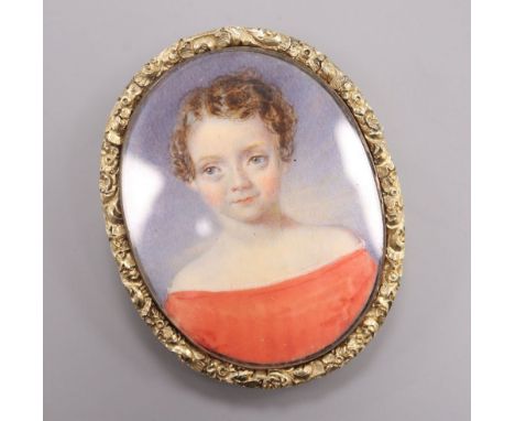 A late 19th century miniature portrait of a girl
