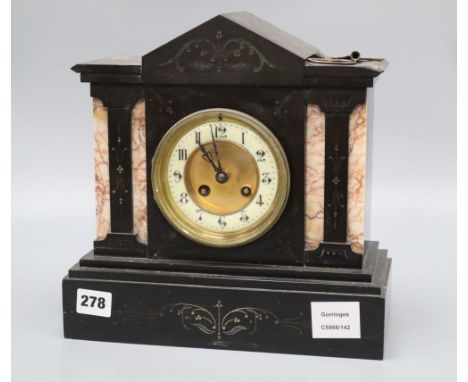 A French black and rouge marble eight day mantel clock