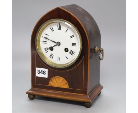 An Edwardian lancet shaped inlaid mantel clock