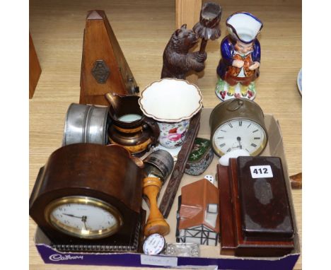 A mixed group of collectables including a Black Forest bear candlesticks, a metronome, etc.