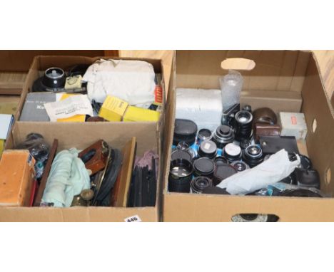 A quantity of cameras and camera equipment