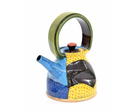 John Pollex - studio pottery stoneware and slip decorated teapot, of abstract waisted form with ribbon handle over, 7.75" hig