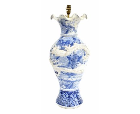 Chinese large blue and white slender baluster vase (converted to a lamp), with frill rim over the body entwined with a dragon