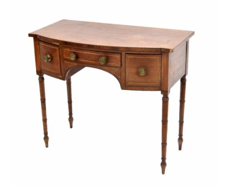 Late Regency mahogany bowfront side table, with a central drawer over the arched frieze flanked by two drawers each with boxw