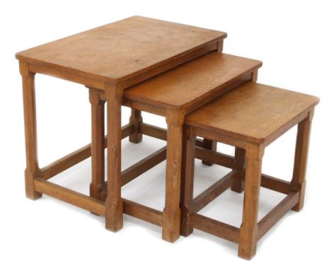 Robert 'Mouseman' Thompson nest of three English oak side tables, each with carved signature mouse, the largest 24" wide, 15"