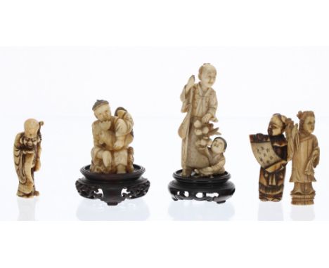 Collection of five carved Japanese ivory netsuke and okimono, all modelled as gentlemen in various pursuits holding scrolls, 