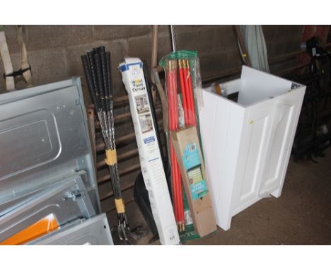 An inset panel curtain; drain rods; gardening tools etc
