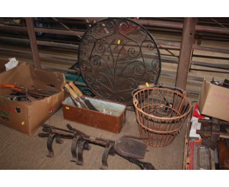 A circular spark guard; together with a metal basket; copper planter; companion set and fire dogs etc.