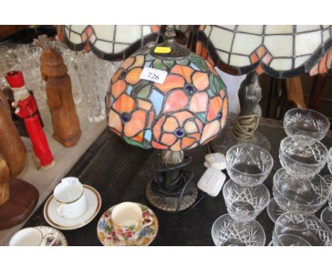 A Tiffany style lamp and shade