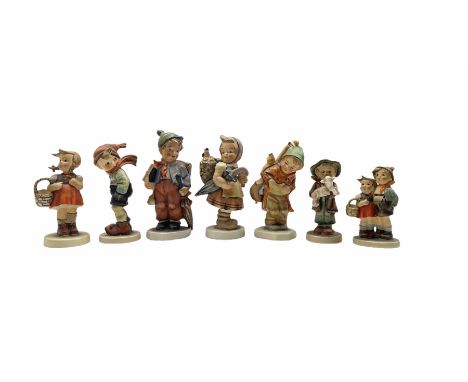 Four Hummel figures together with three similar Friedel figures, max H16cm (7)