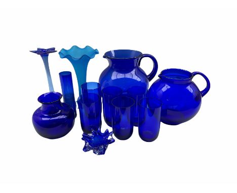 Bristol Blue glass to include two globular form jugs, set of six tumblers, two vases and a posy vase, together with a blue fr