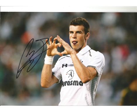 Gareth Bale Signed 8x12 Tottenham Hotspur Photo. Good condition. All autographs come with a Certificate of Authenticity. We c