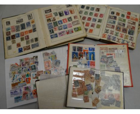 A parcel of six vintage small stamp albums