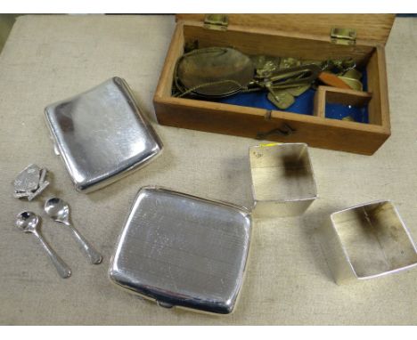 Parcel of hallmarked silver items including cigarette cases, napkin rings together with a small boxed brass weighing scales