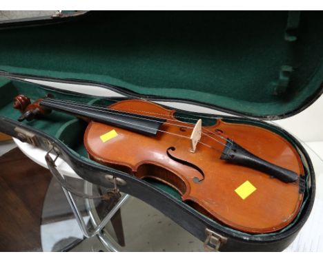 A vintage cased Ruggielli violin
